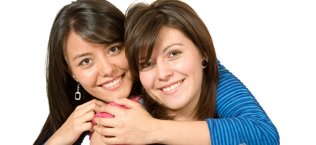 two ladies smiling